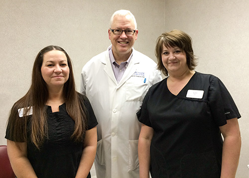 Dr. Anderson and his staff Dr. Anderson and his staff